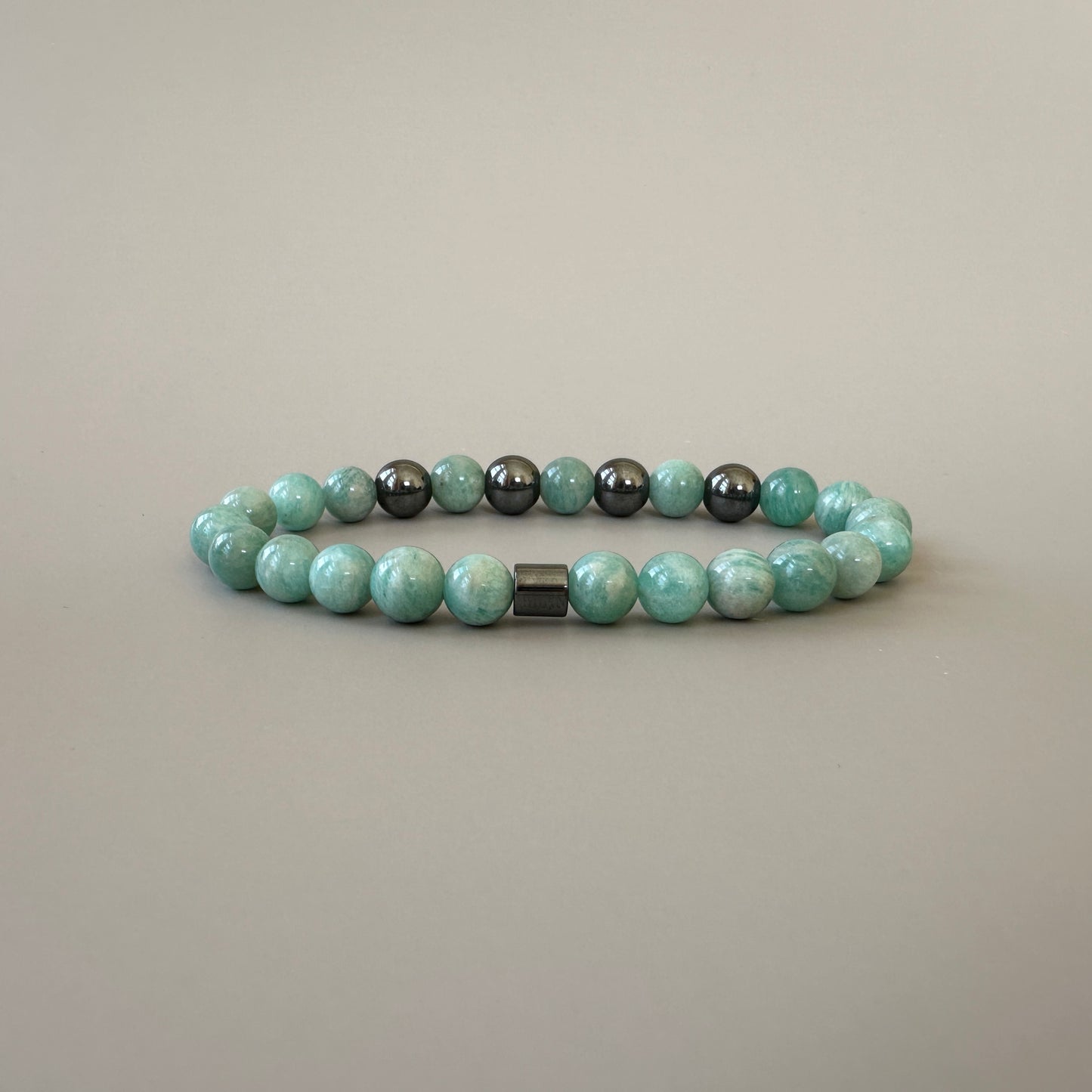 Close-up of Natural Amazonite Bracelets for couples, showcasing their calming blue-green hues and stylish design.