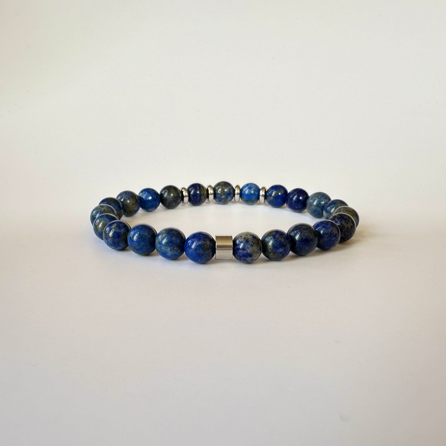 atural Lapis Lazuli Bracelets for Couples displayed, highlighting the stunning blue stones and refined craftsmanship.