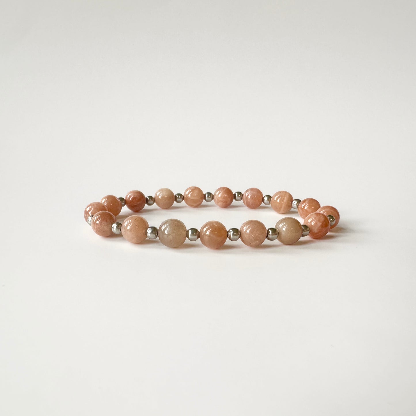 Luxury Natural Sunstone Bracelet, with shimmering tones, promoting positivity, confidence, and emotional uplifting.