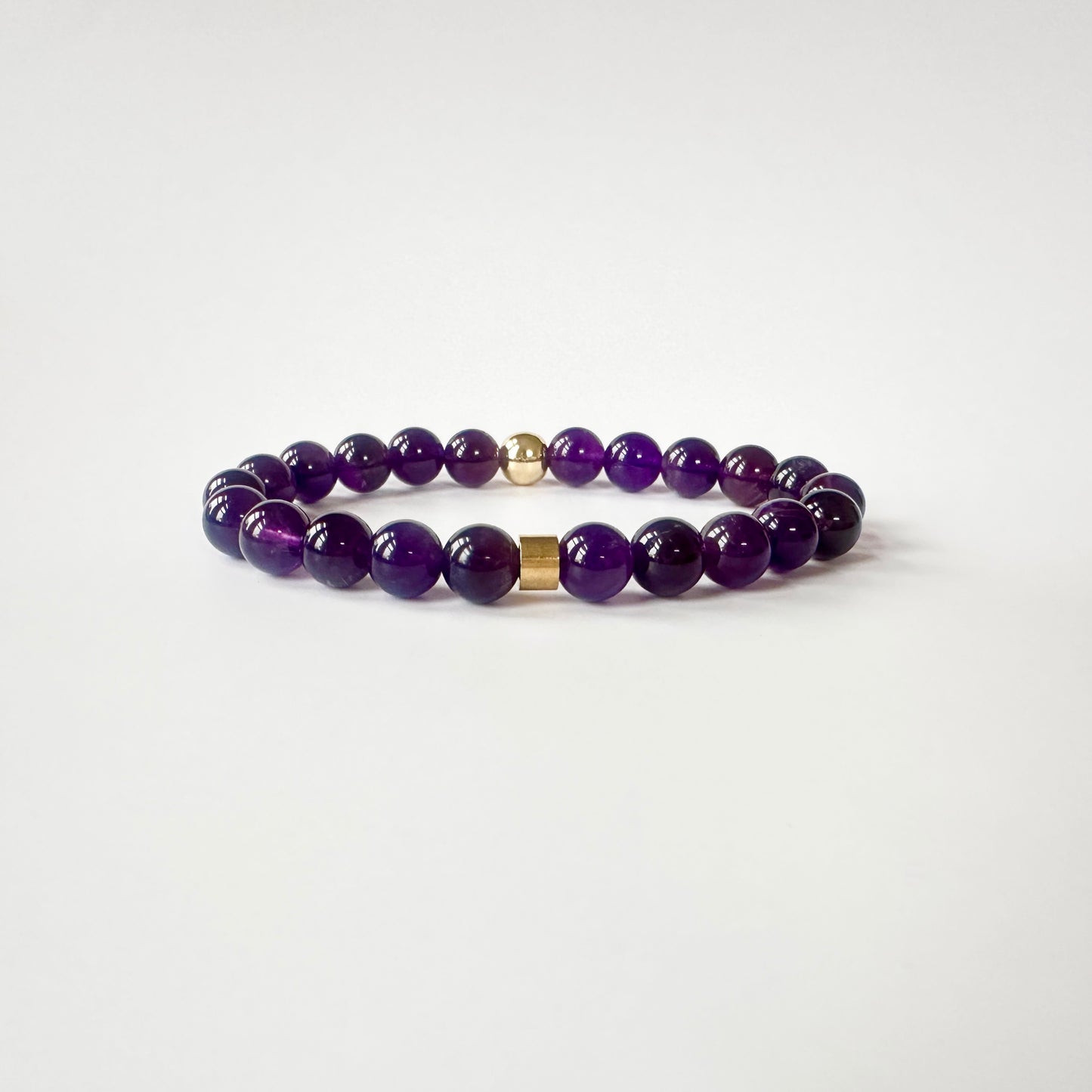 Elegant Natural Amethyst Bracelet with deep purple gemstones, representing tranquility, balance, and spiritual growth.