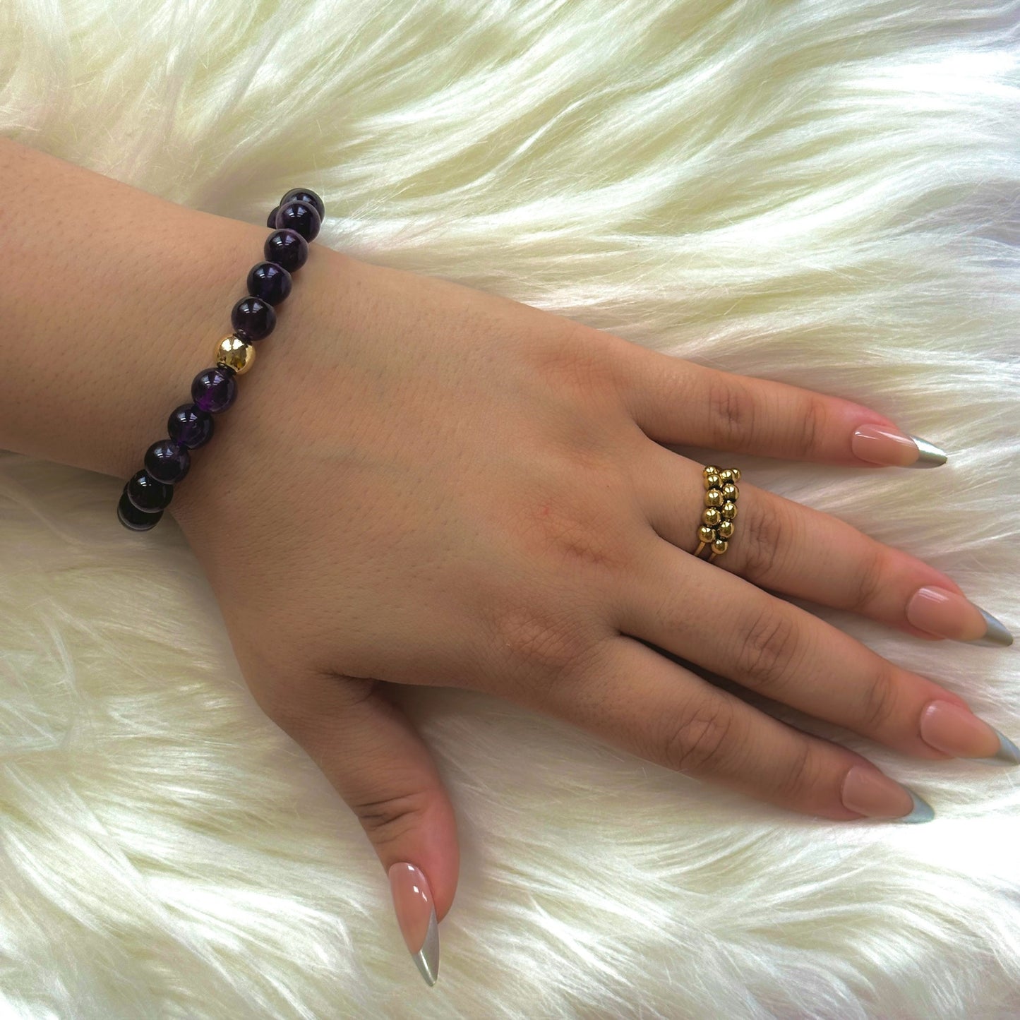 Elegant Natural Amethyst Bracelet with deep purple gemstones, representing tranquility, balance, and spiritual growth.