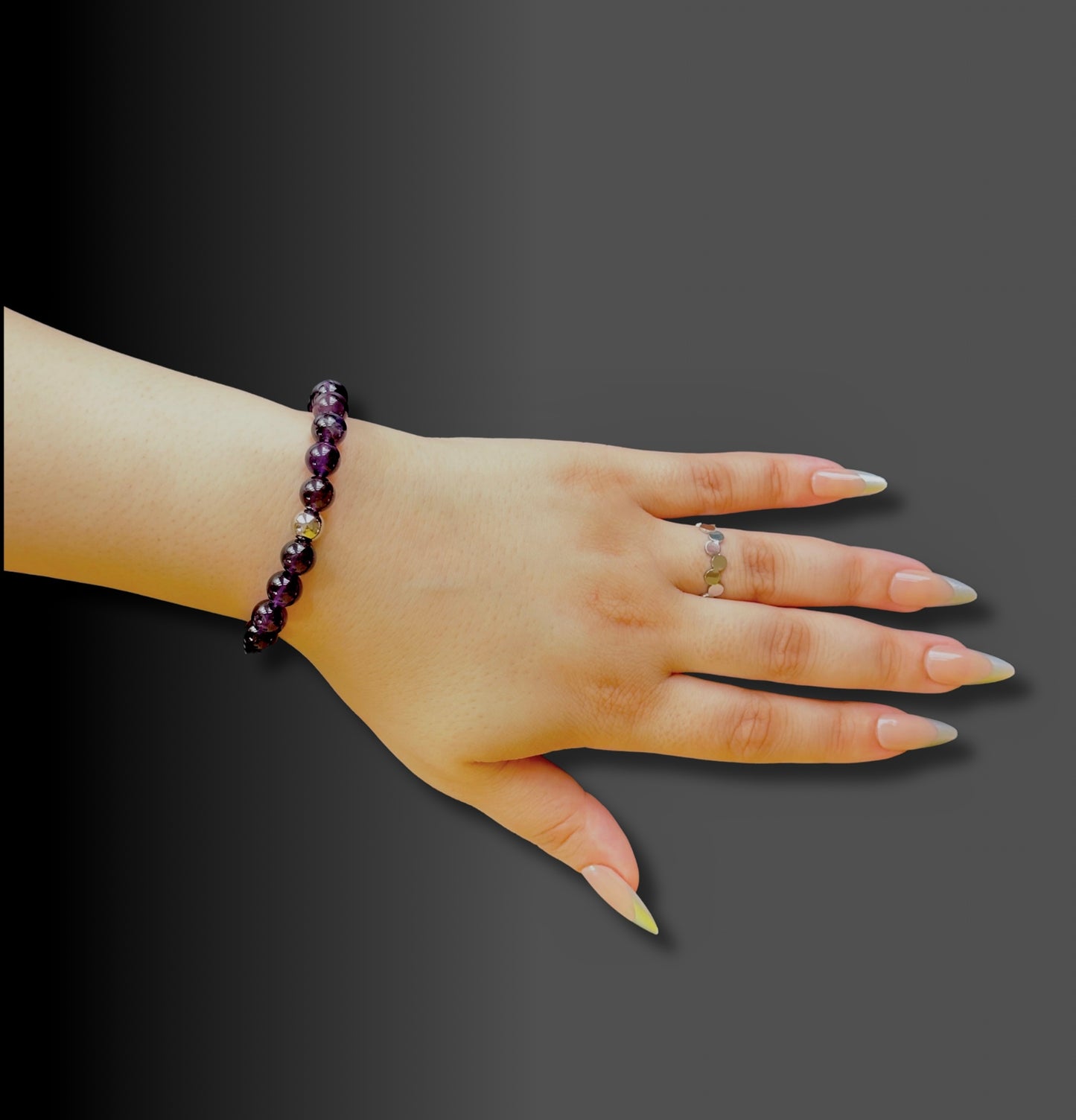 Elegant Natural Amethyst Bracelet with deep purple gemstones, representing tranquility, balance, and spiritual growth.