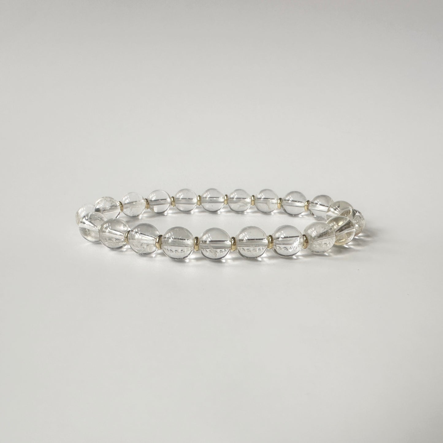 Radiant Natural Clear Quartz Bracelet with transparent gemstones, amplifying spiritual energy, balance, and healing.