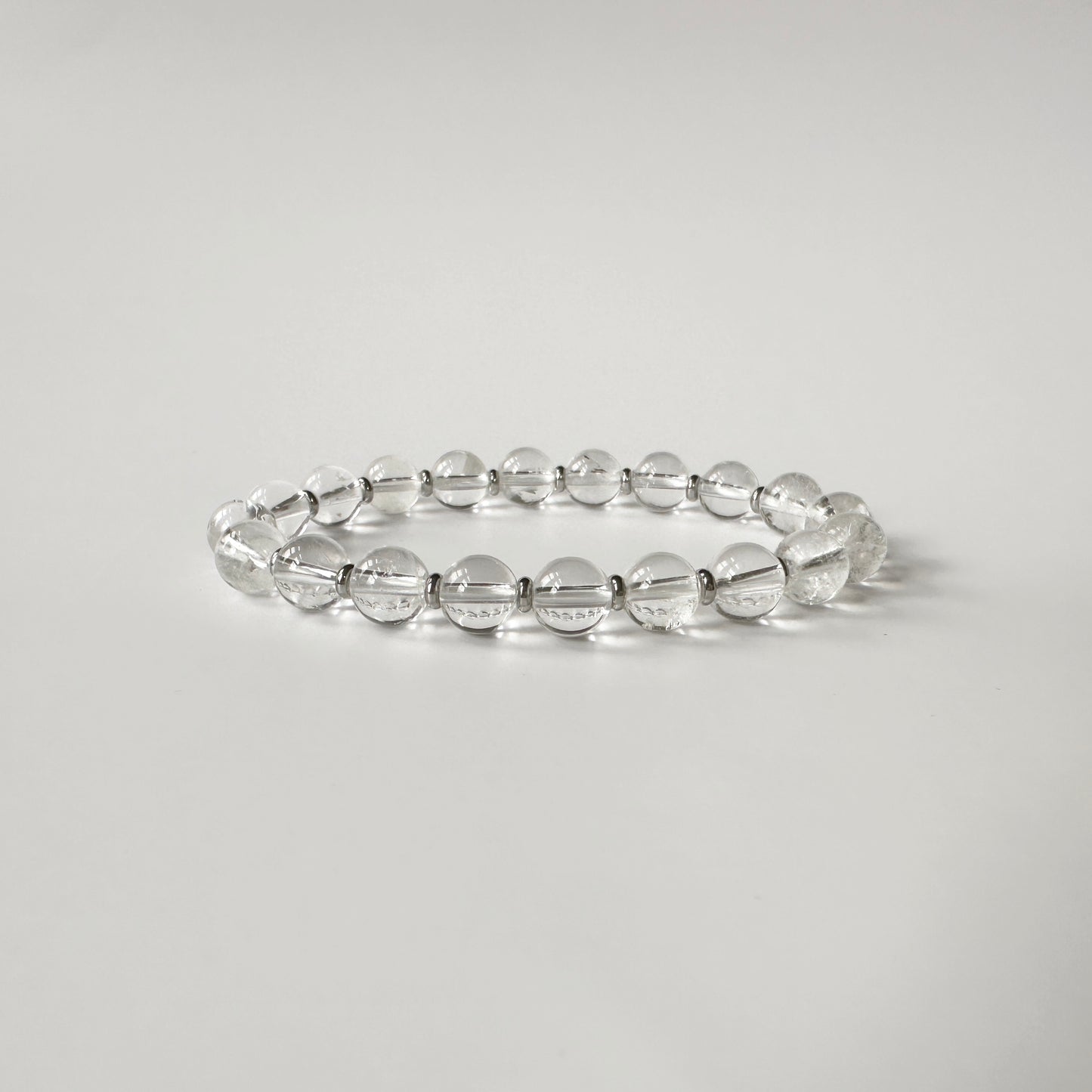 Radiant Natural Clear Quartz Bracelet with transparent gemstones, amplifying spiritual energy, balance, and healing.