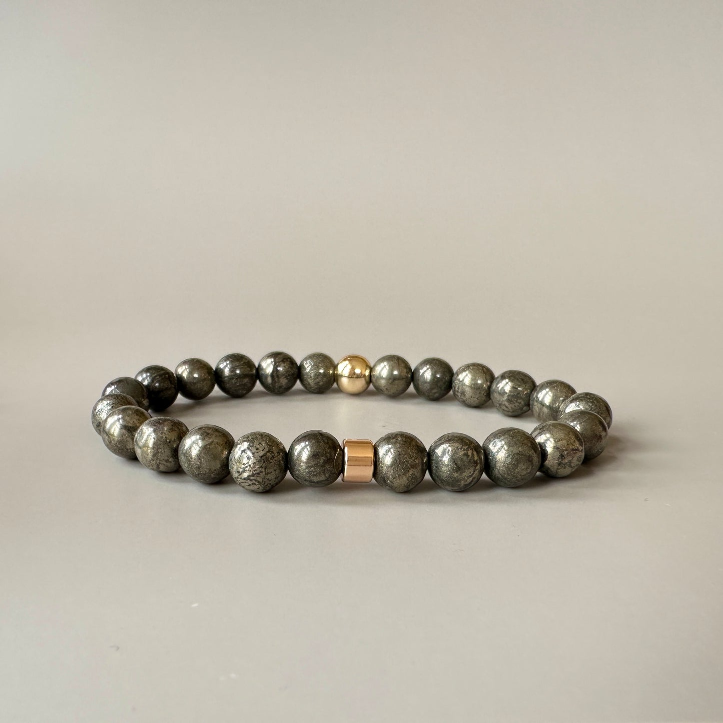 Front view of the Natural Pyrite Bracelet for Him, featuring metallic pyrite stones with a sleek design.