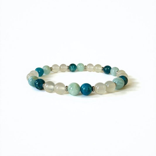 Celestial Serenity Bracelet with aquamarine, apatite, and white agate gemstones, promoting healing, clarity, and emotional balance.