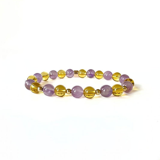 Close-up of Lavender Amethyst and Citrine gemstone beads