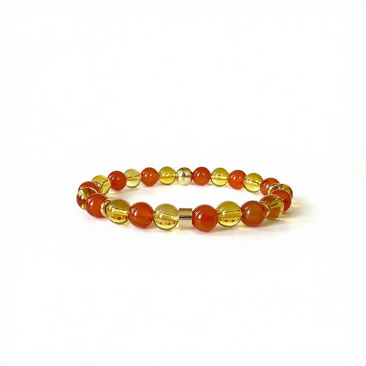 Apollo's Prosperity Bracelet with Citrine and Red Carnelian stones, symbolizing abundance, motivation, and positivity in a stylish design.