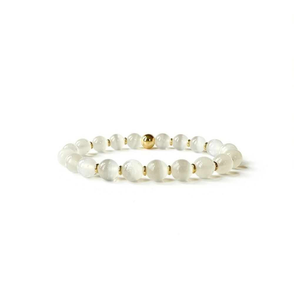Close-up of polished Selenite gemstone bracelet
