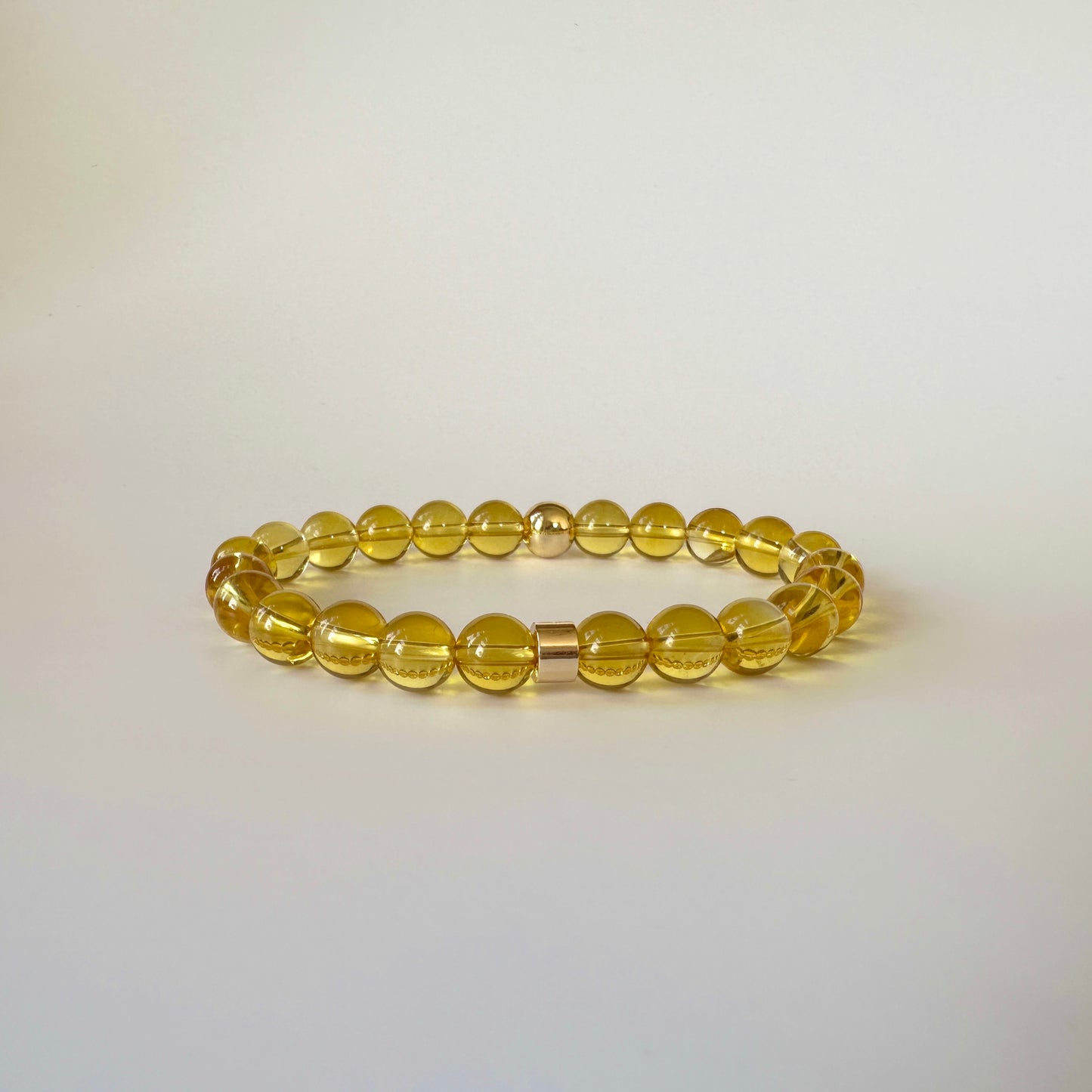 Close-up of Natural Citrine Bracelets for couples, showcasing their vibrant yellow hues and timeless design.