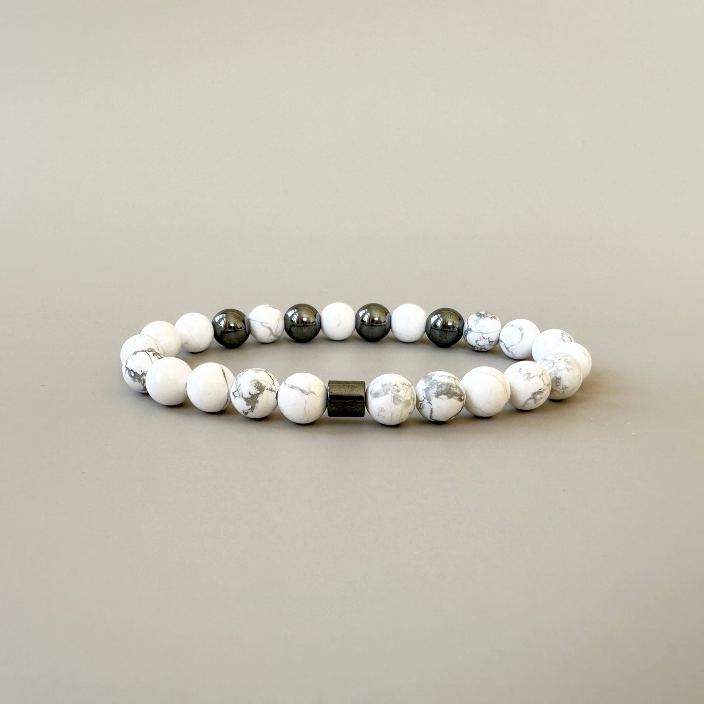 Close-up of Natural Howlite Bracelets for couples, showcasing their smooth white finish and calming design.