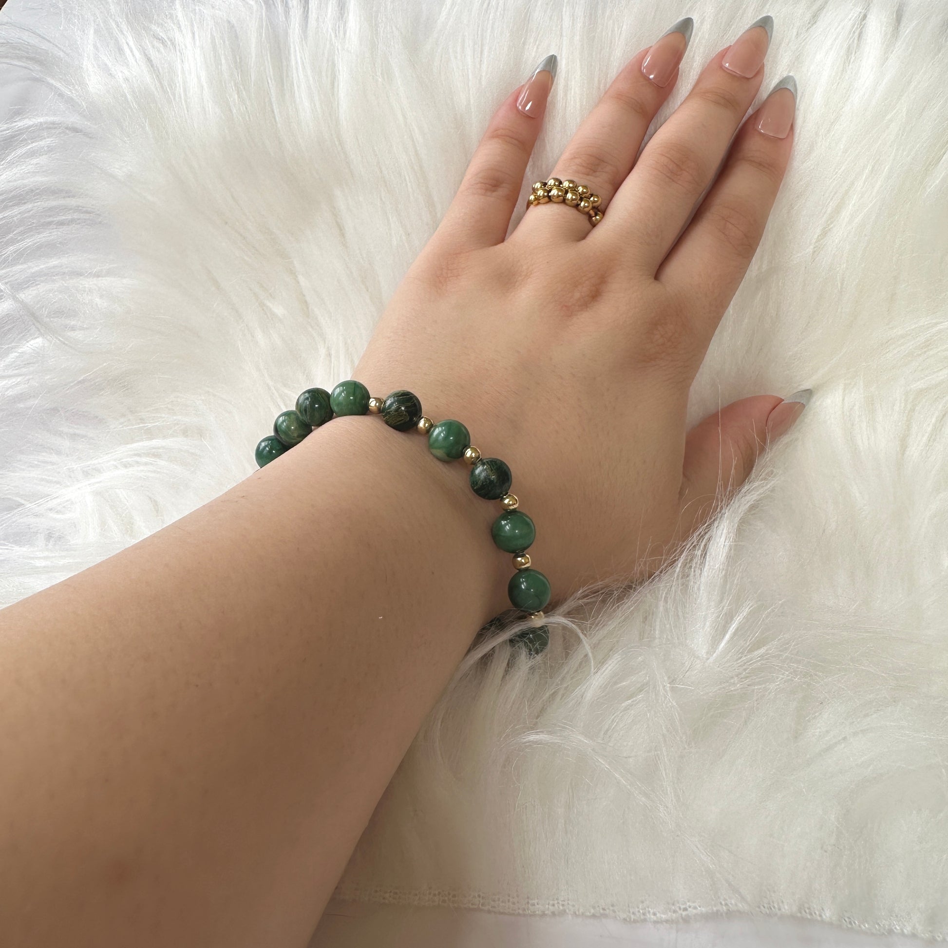 Elegance Natural Jade Bracelet with green jade gemstones, symbolizing protection, harmony, and positive energy.