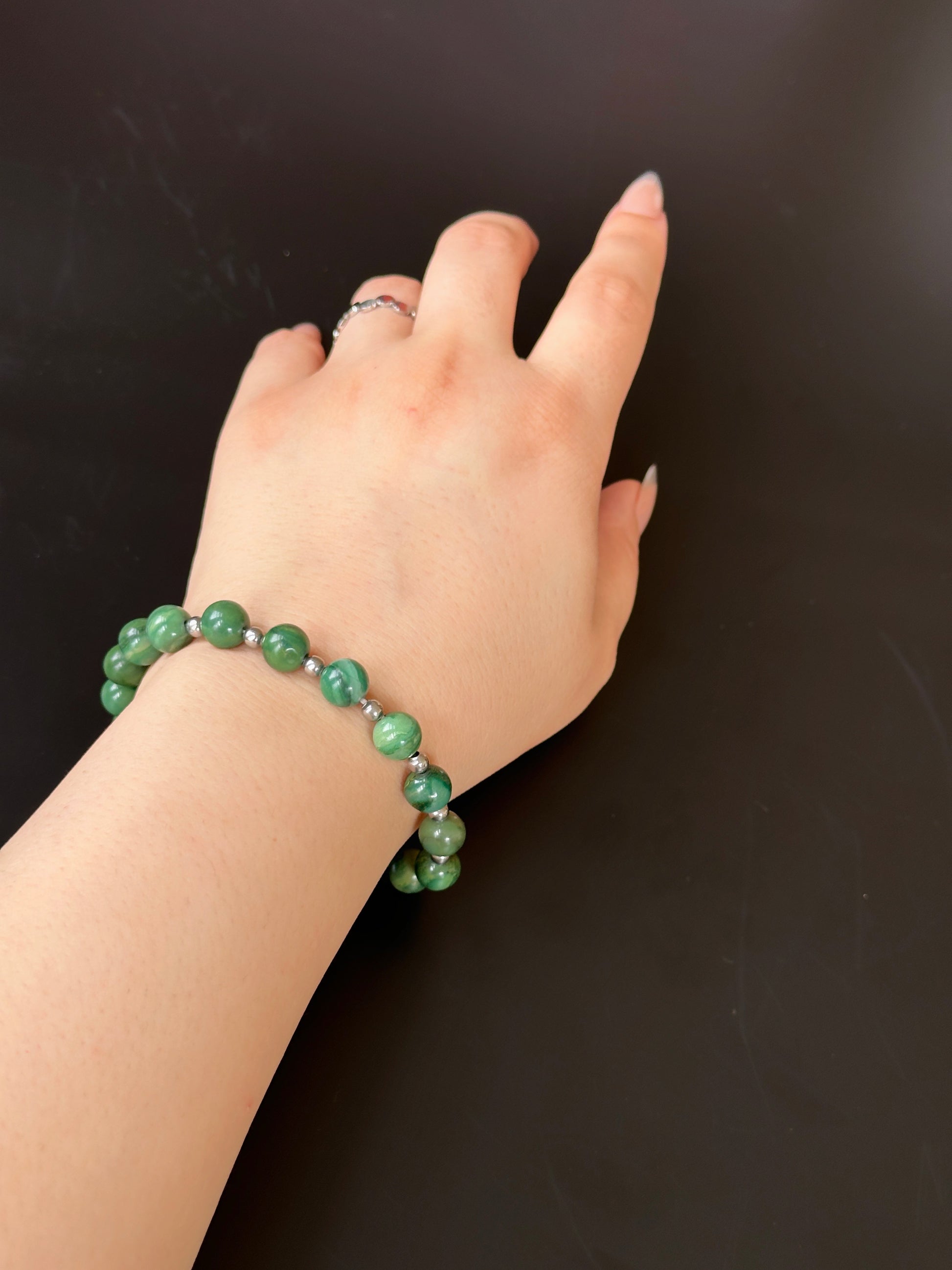 Elegance Natural Jade Bracelet with green jade gemstones, symbolizing protection, harmony, and positive energy.