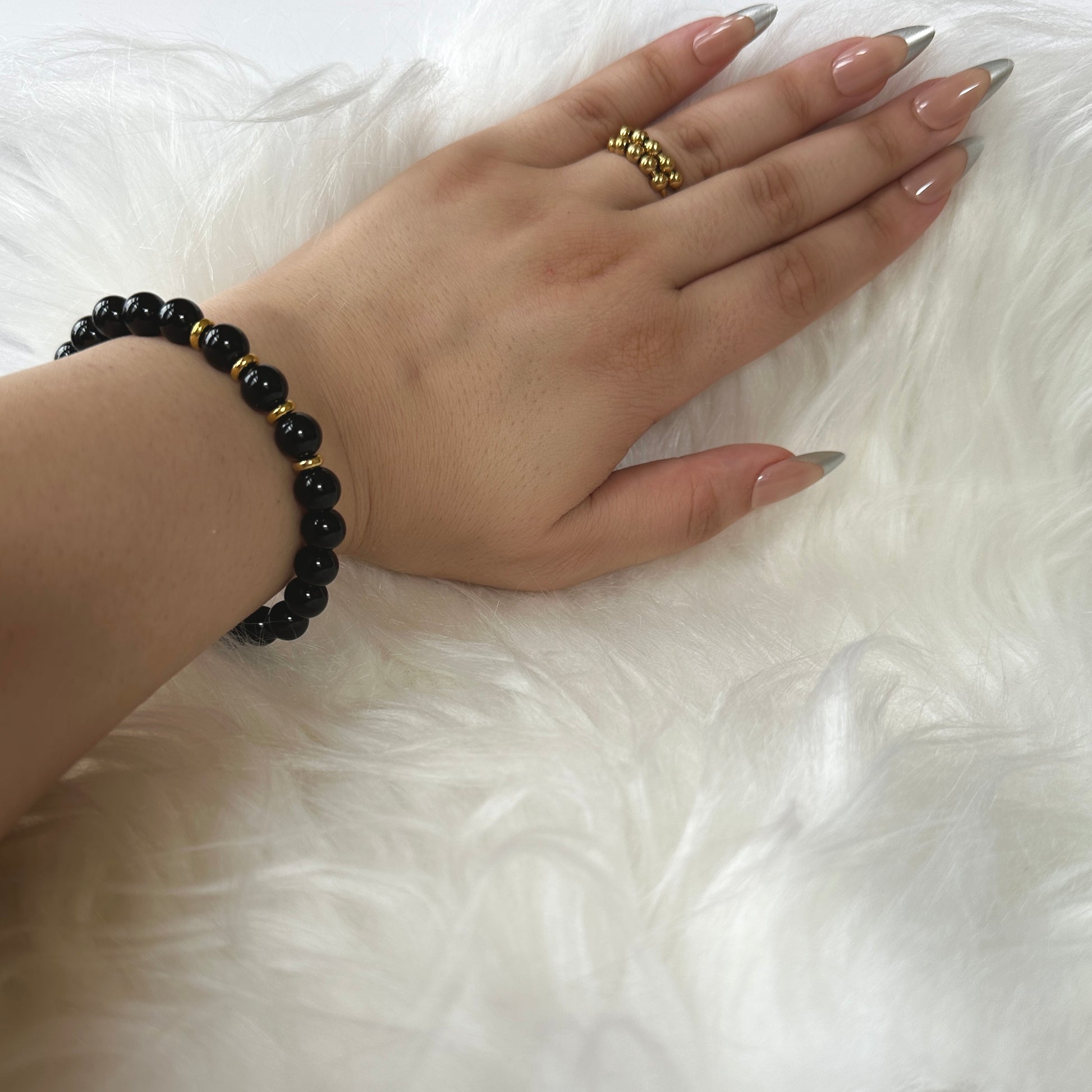 Elegant Natural Black Onyx Bracelet, symbolizing transformation and protection with its striking black tones and powerful energy.