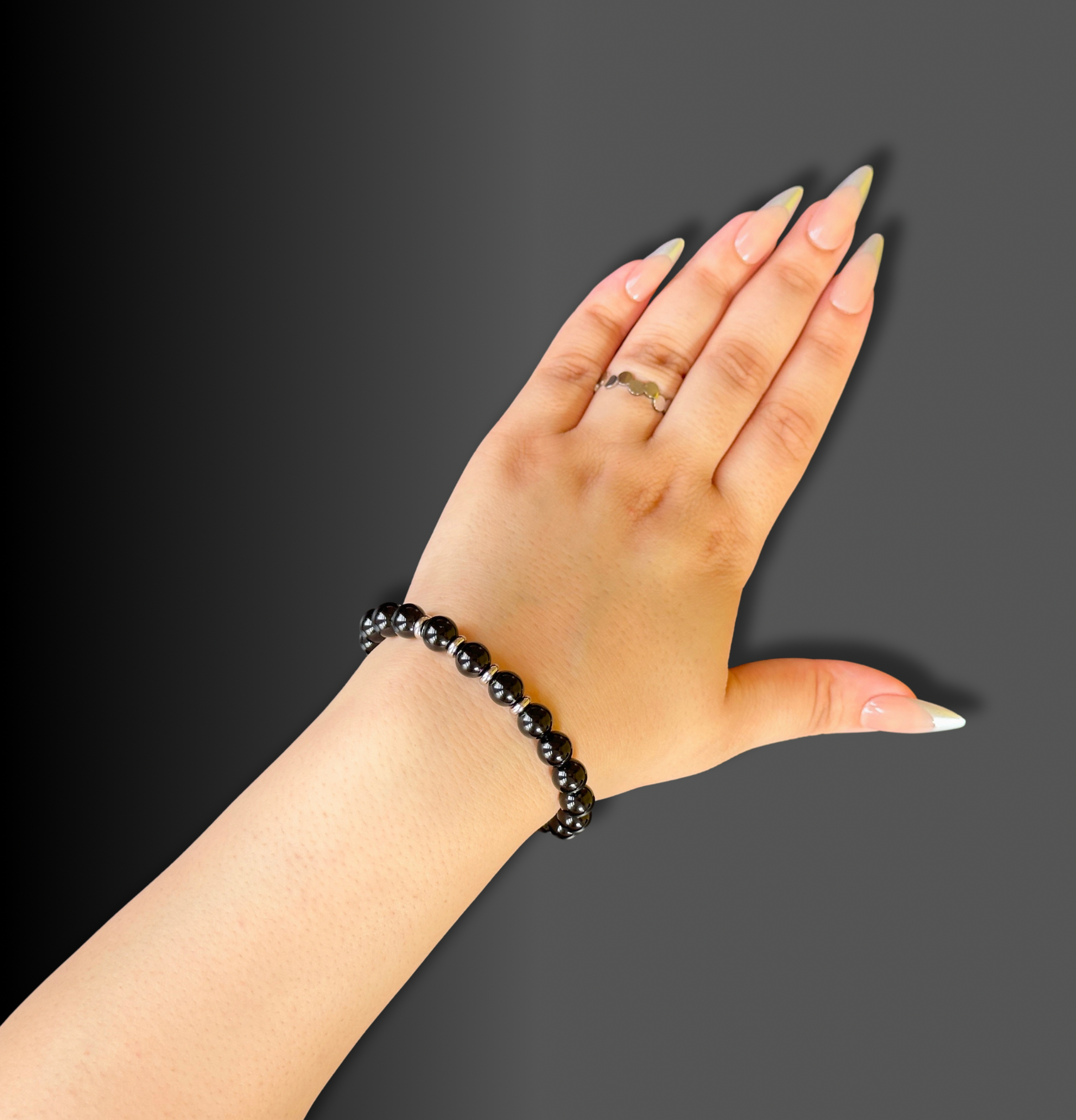 Elegant Natural Black Onyx Bracelet, symbolizing transformation and protection with its striking black tones and powerful energy.