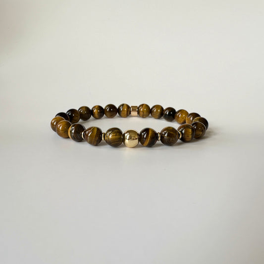 Eye-Catching Natural Tiger Eye Bracelet with golden-brown tiger eye gemstones, promoting protection, vitality, and confidence.