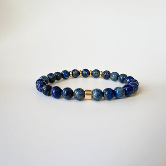 Exquisite Natural Lapis Lazuli Bracelet with deep blue gemstones, symbolizing confidence, clarity, and wisdom.