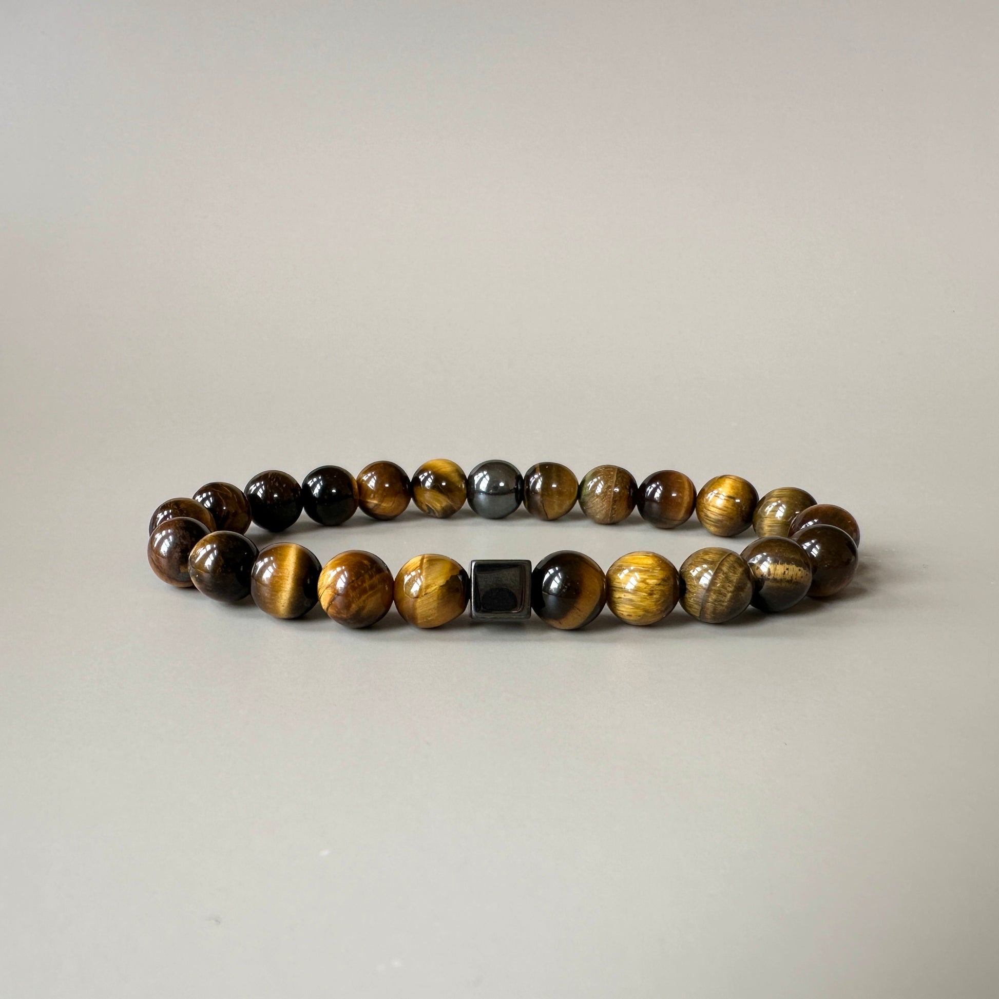 Front view of the Natural Tiger Eye Bracelet for Him, featuring bold tiger eye beads with rich golden and brown tones.