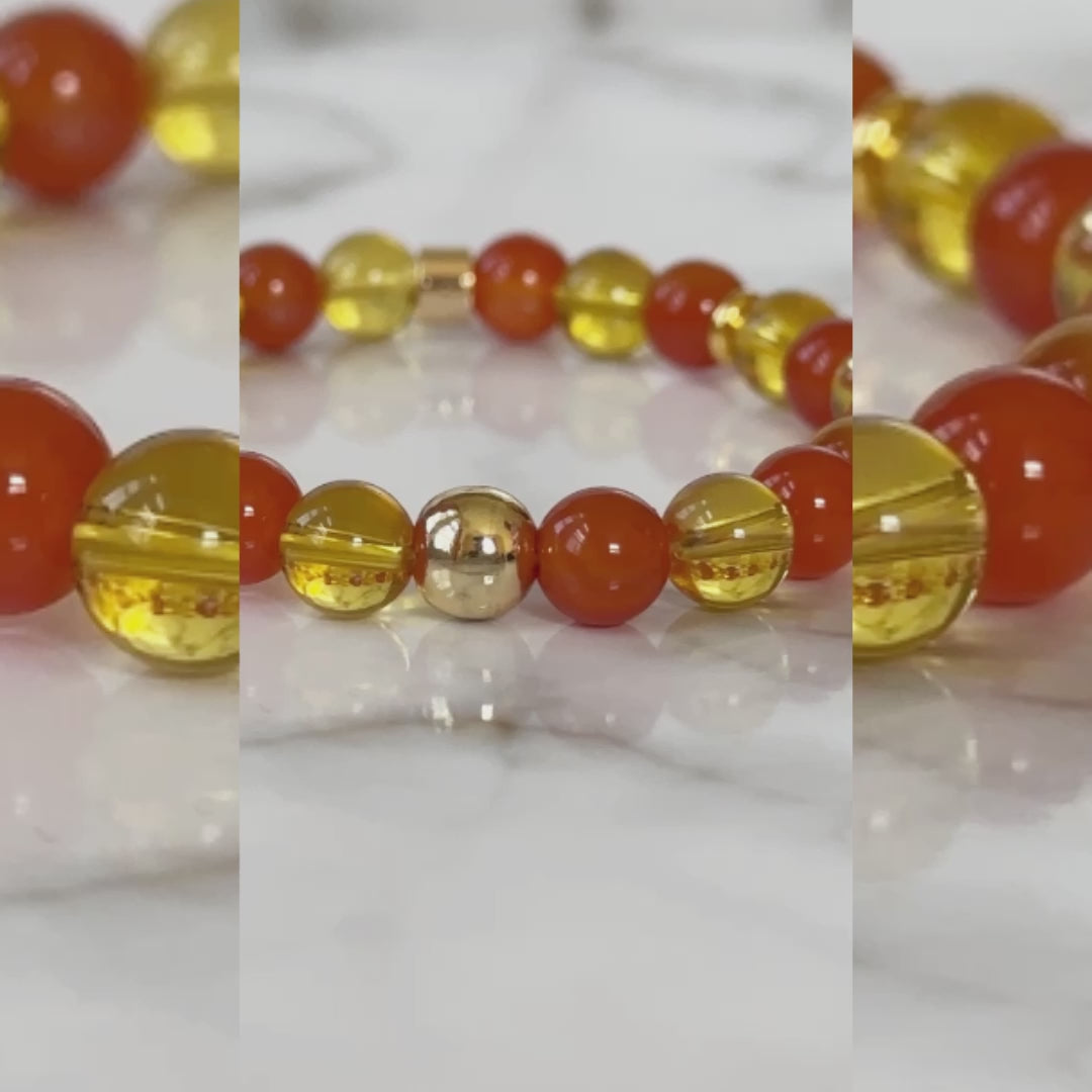 Apollo's Prosperity Bracelet with Citrine and Red Carnelian stones, symbolizing abundance, motivation, and positivity in a stylish design.