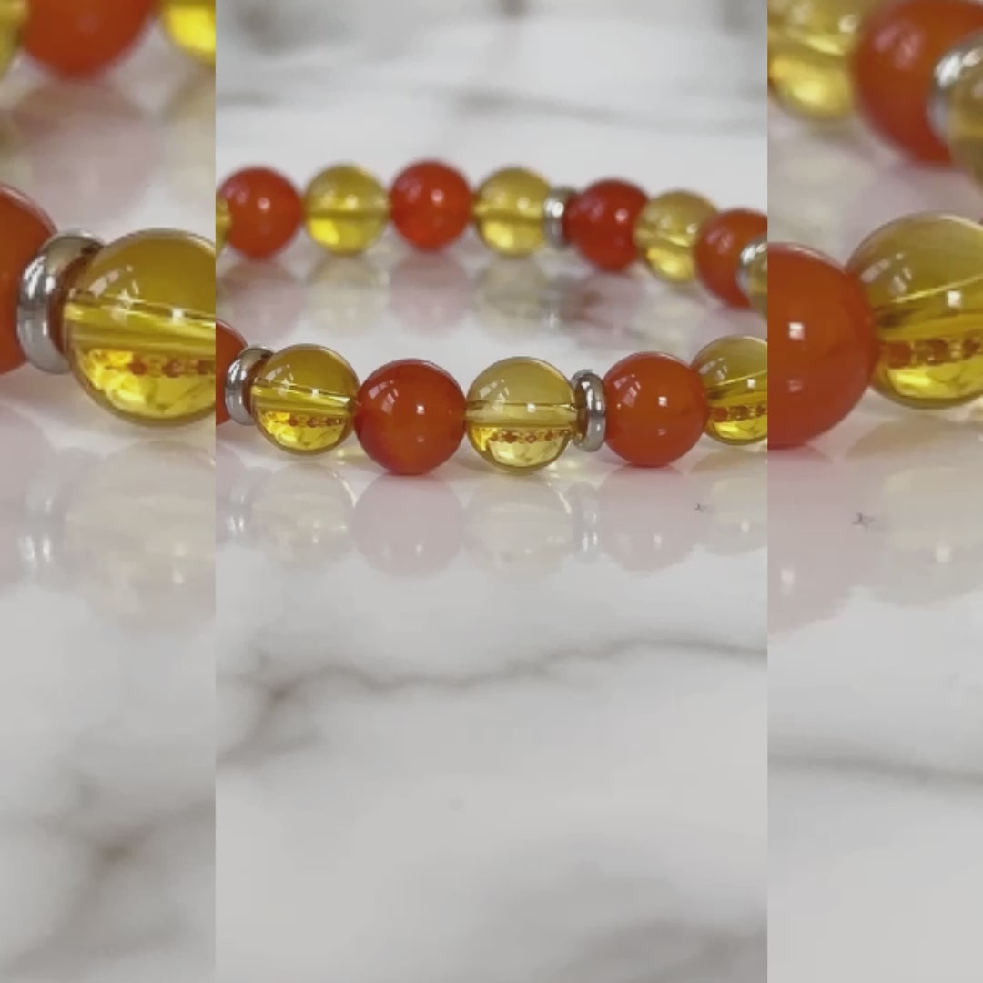Apollo's Prosperity Bracelet with Citrine and Red Carnelian stones, symbolizing abundance, motivation, and positivity in a stylish design.
