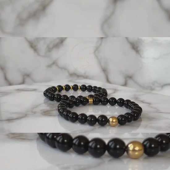 Natural Black Onyx Bracelets for Couples displayed, emphasizing the deep black color and sophisticated design.