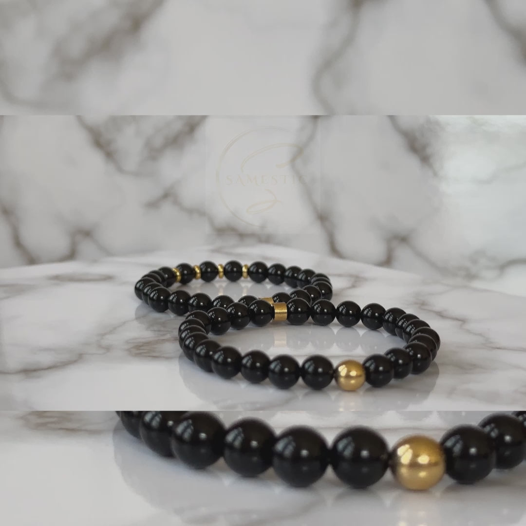 Natural Black Onyx Bracelets for Couples displayed, emphasizing the deep black color and sophisticated design.