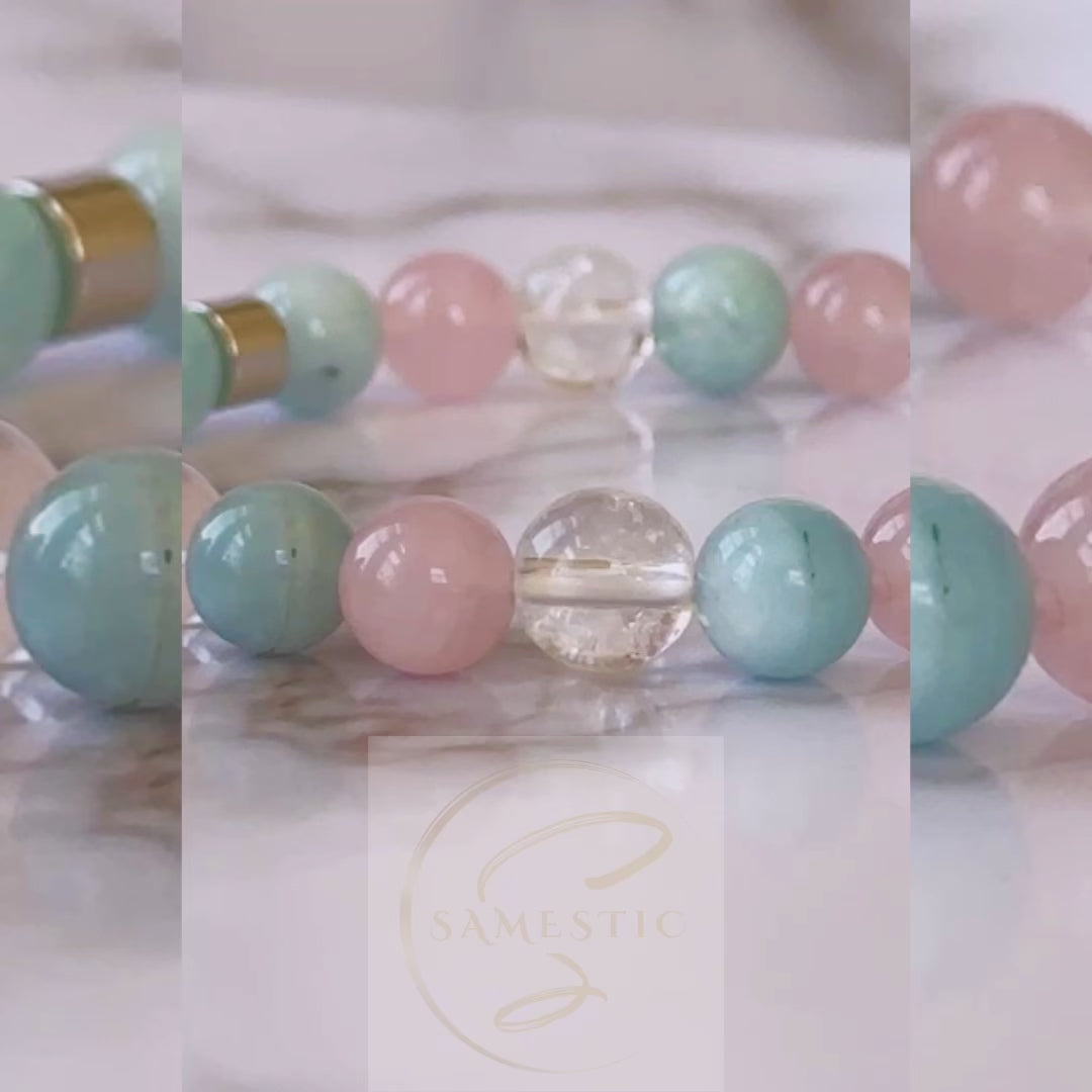 Athena's Radiance Bracelet featuring a blend of rose quartz, clear quartz, and aquamarine gemstones, symbolizing love, clarity, and courage.