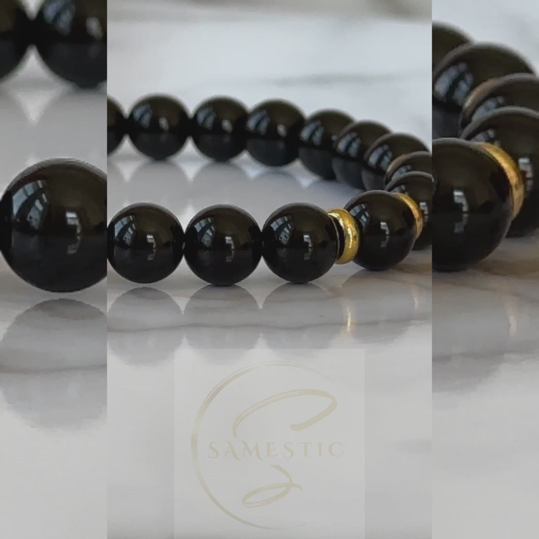 Elegant Natural Black Onyx Bracelet, symbolizing transformation and protection with its striking black tones and powerful energy.