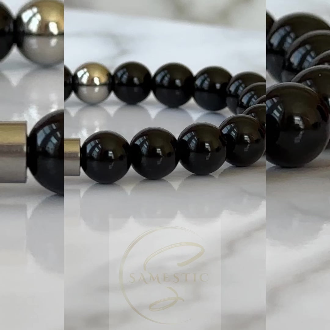 Natural Black Onyx Bracelet displayed with its sleek black stones, symbolizing transformation and protection.