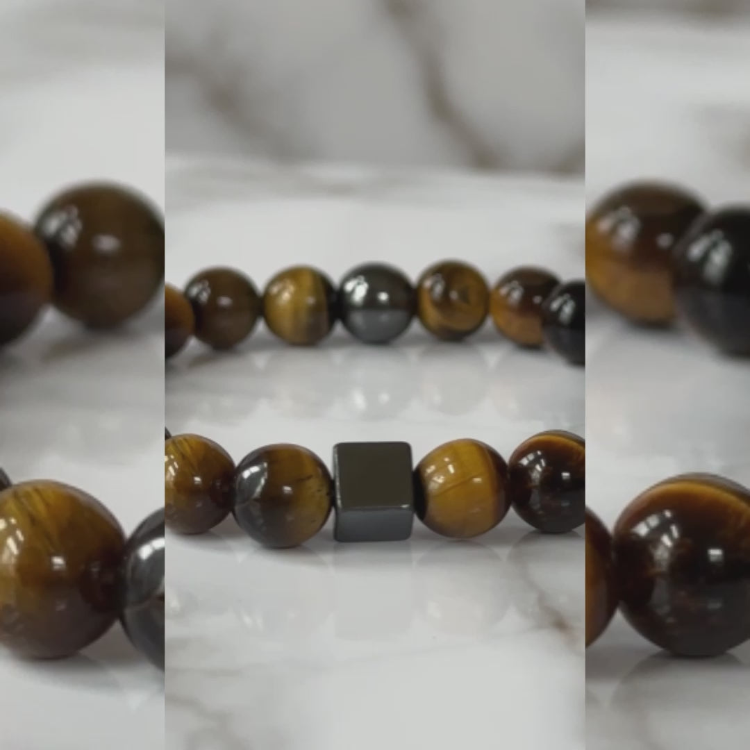 Natural Tiger Eye Bracelet displayed with its rich golden and brown stones, symbolizing protection and vitality.